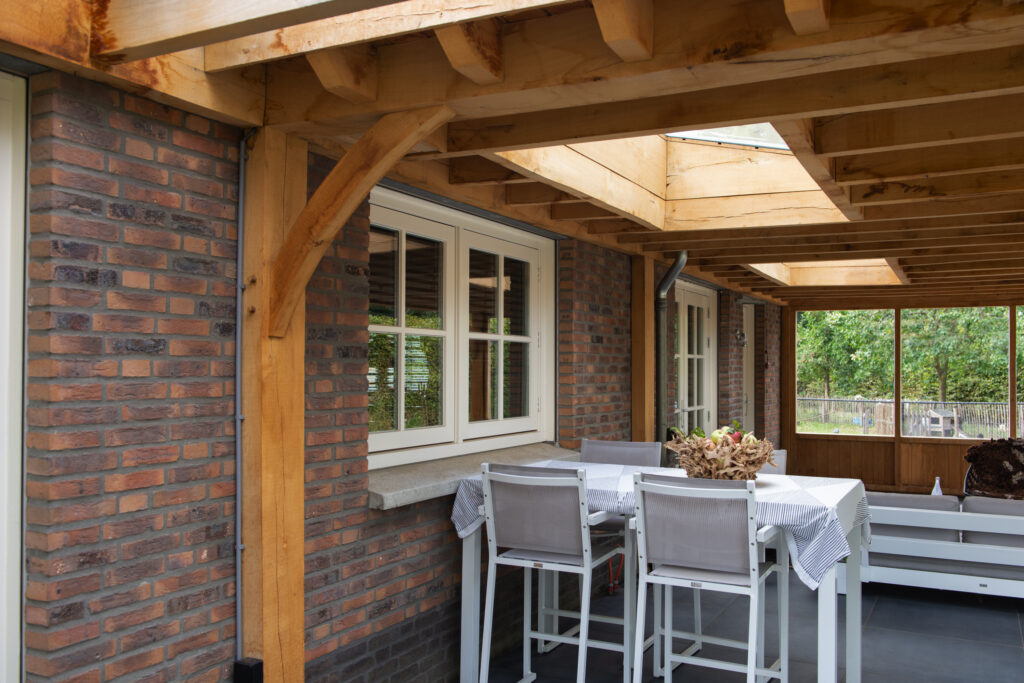 Robuuste aanbouw met pergola Tilburg – foto 12